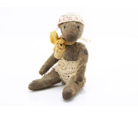 A World War One larger size Soldier teddy bear, with dark blonde mohair, black headed glass pin eyes, pipe-cleaner ear, prono