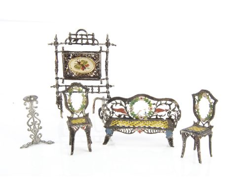 A small scale soft metal sofa and chairs,  by a ‘flat’s manufacturer with ornate decoration —3in. (7.5cm.) width of sofa; a l