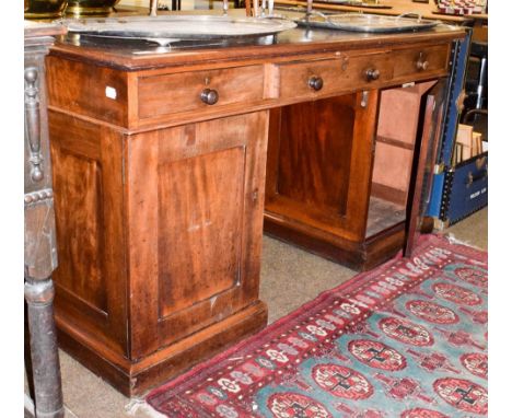 A late Victorian leather inset mahogany partners desk, 137cm by 92cm by 75cm