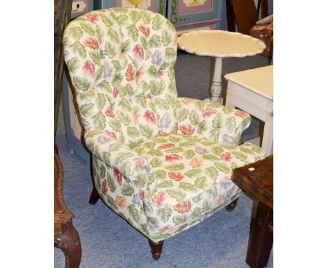 A Liberty &amp; Co. button back occasional chair, the fabric printed with autumnal leaves