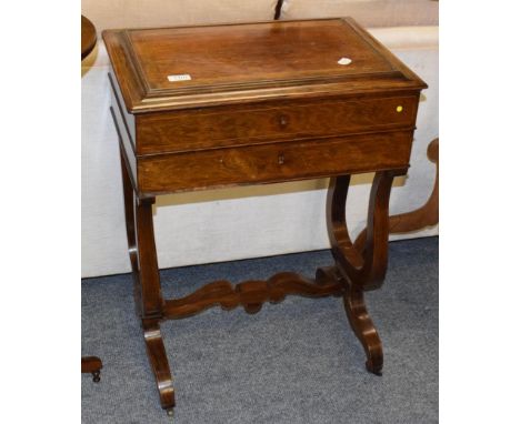 A 19th century inlaid rosewood work table, the shallow caddy form hinged lid fitted with a mirror and opening to reveal a fit