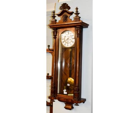 A Vienna type double weight driven wall clock, circa 1890, 115cm high