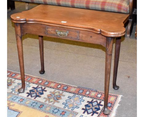 A18th century walnut fold-over card table, 91cm by 45cm by 71cm