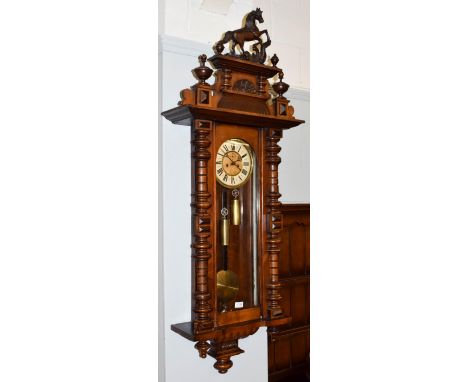 A Victorian Vienna type double weight driven wall clock, circa 1890, 120cm high