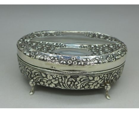 A silver oval embossed trinket box, Birmingham 1908, width 12.5cm