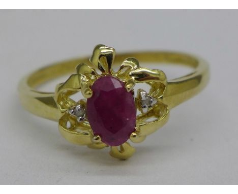 A 9ct gold, ruby and diamond ring, 1.5g, O