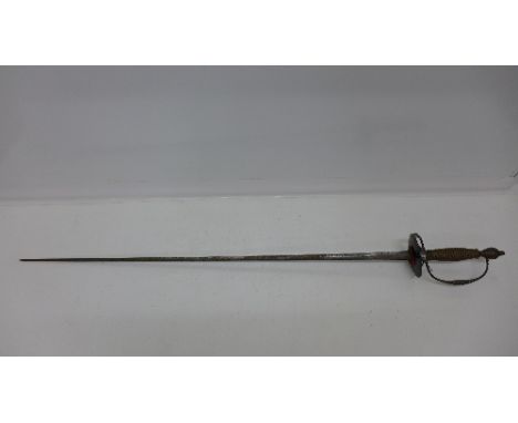 An 18th Century small sword, etched blade, with later plain oval steel guard, no scabbard, length of blade 70cm