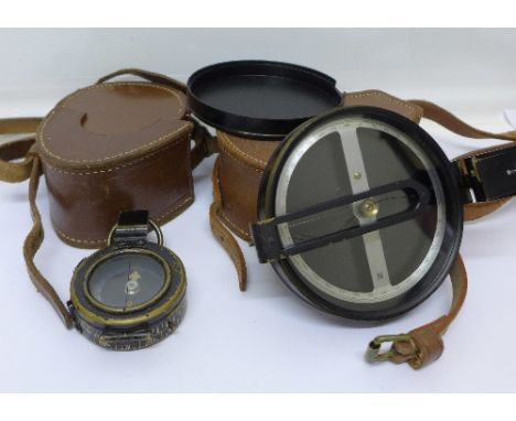 A compass marked F.B &S.(1932) Ltd., also marked with broad arrow and B1306, with leather case, a Glauser compass marked NoB.