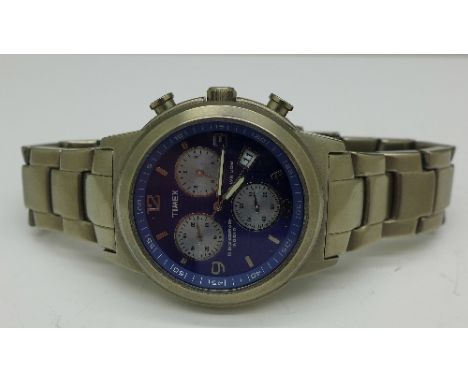 A gentleman's Timex chronograph Indiglo wristwatch with spare link