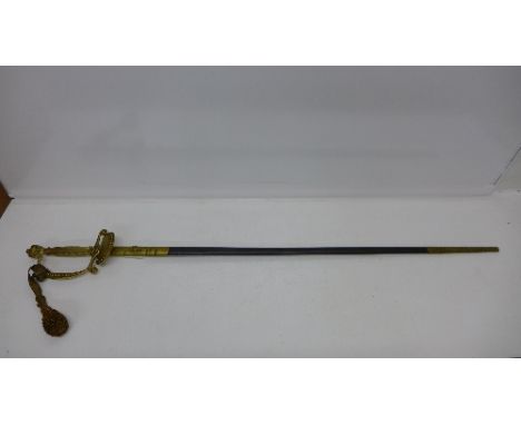 A Queen Elizabeth II dress sword with scabbard, the blade marked Wilkinson