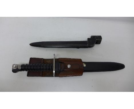 A bayonet with scabbard and frog and one other bayonet with scabbard, bayonet marked No9MK1, D-50