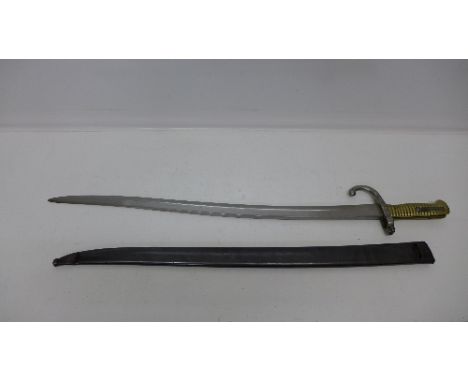 A French bayonet with scabbard, both numbered 5903, the blade marked 1870