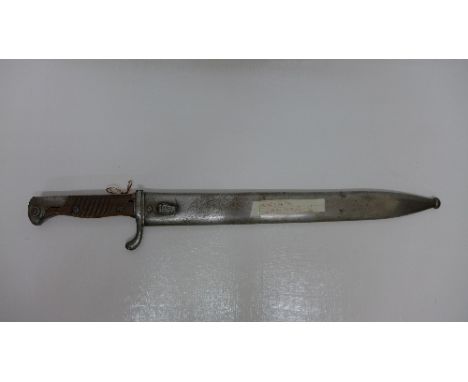 A German bayonet with scabbard, the blade marked Walter & Co.