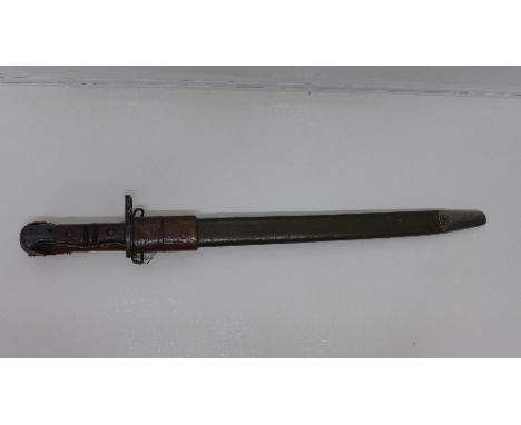 An American bayonet with scabbard and frog, the blade marked U.S., Remington, 1917