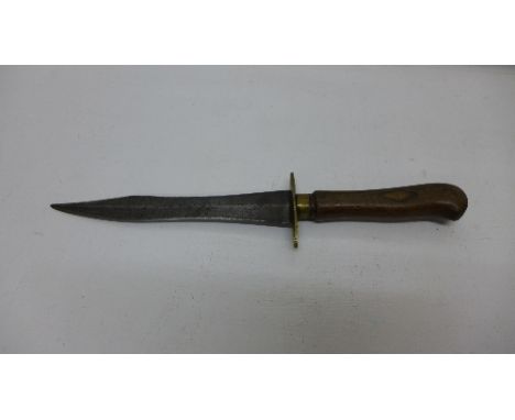 A dagger with wooden handle, no scabbard