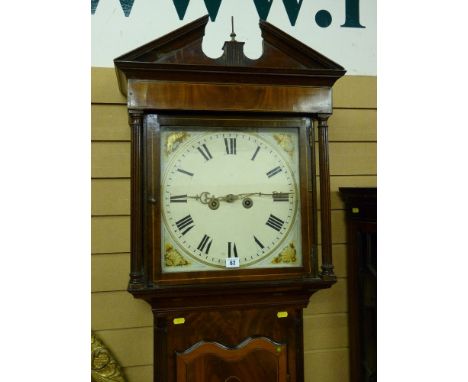 An early 19th Century inlaid mahogany longcase clock, the hood with broken architectural pediment, single glazed door with bo