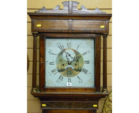 A circa 1800 oak longcase clock with shaped pediment and reeded pillars flanking a single glazed door housing a 13 ins square