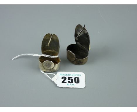 A pair of silver lapel night light holders, undated and unmarked