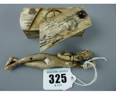 A carved stained bone of a reclining nude female, 11 cms long and a stained bone lidded snuff box with scrimshaw type decorat