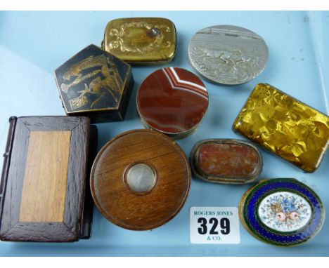 A collection of nine various pill boxes to include a gilt metal example with enamel decoration of floral sprays, two metal an