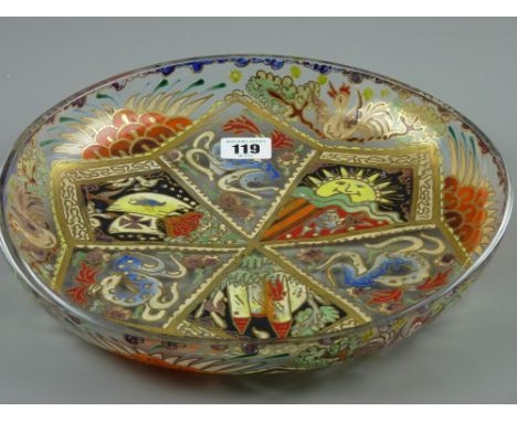 An early 20th Century Spanish glass shallow bowl having flamboyant gilt and colourful enamel decoration by Jose Royo, signed 