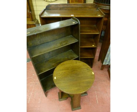 A mahogany four shelf railback bookcase, an oak four shelf bookcase and a circular topped oak side table