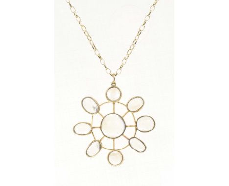 A moonstone pendantDesigned as a circular moonstone cabochon within a circular and oval moonstone cabochon openwork surround,