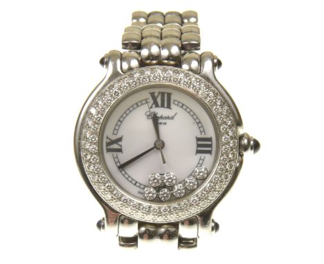 A Chopard stainless steel 'Happy Sport' wristwatchThe circular white dial with Roman numeral quarter markers and seven loose 