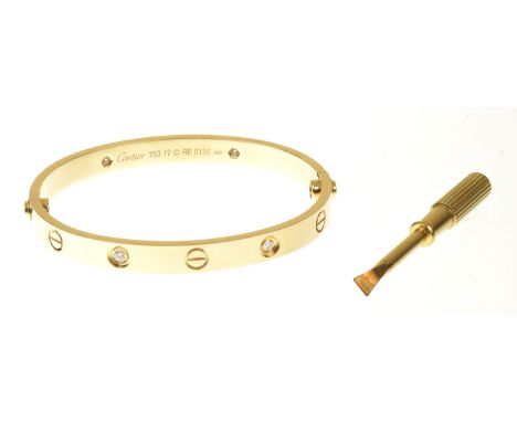 An 18ct gold diamond Cartier 'Love' bangleDesigned as a series of brilliant cut diamond collets and screw-head motifs on a fi