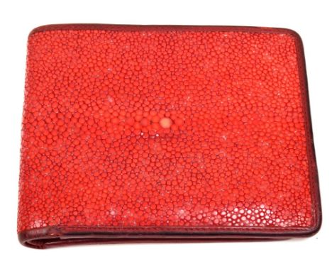 An Oliver Sweeney shagreen walletThe red shagreen folding wallet, with suede lining and eight card pockets, embossed Oliver S