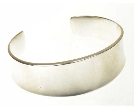 A Georg Jensen bangleNumbered 188, the torque bangle with slightly tapered terminals, stamped Georg Jensen, 925S, length of i