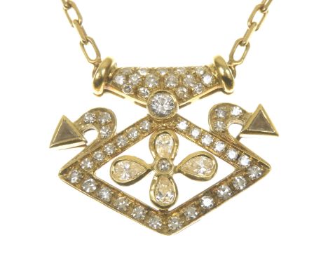 A diamond necklaceThe pear cut diamond quatrefoil within an openwork single cut diamond kite shape surround and triangular sh