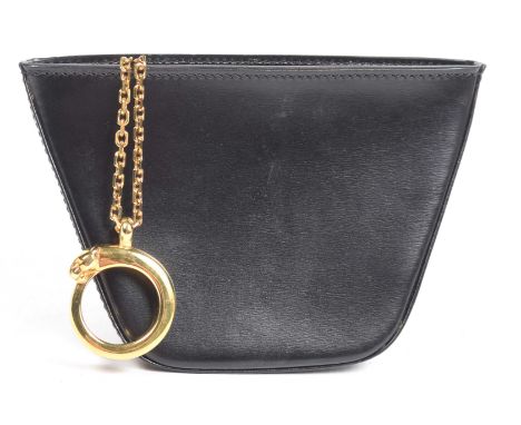 A Cartier 'Panthère' clutch bagThe black trapeze shape pouch with gold-tone zip and chain strap terminating with a panthère r