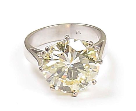 An impressive diamond solitaire ringThe brilliant cut diamond, weighing 10.08cts, within an eight claw setting, accompanied b
