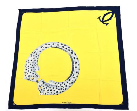 A Must De Cartier silk scarfThe Panthère bangle, on a yellow ground with navy blue border and double C logo, marked 'Must De 