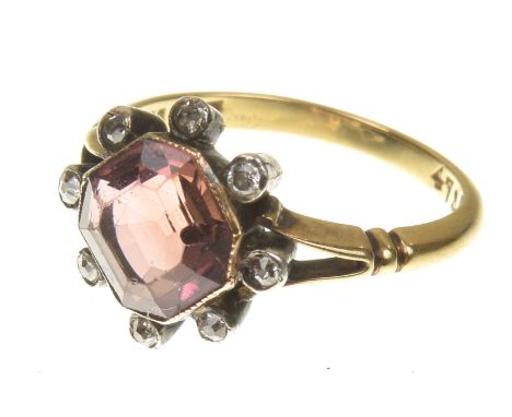 A late Victorian tourmaline and diamond dress ringThe square shape pink tourmaline within an old cut diamond collet surround,