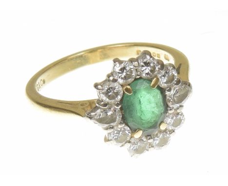 A Garrard 18ct gold emerald and diamond cluster ringThe oval shape emerald with pear shape diamond sides and brilliant cut di