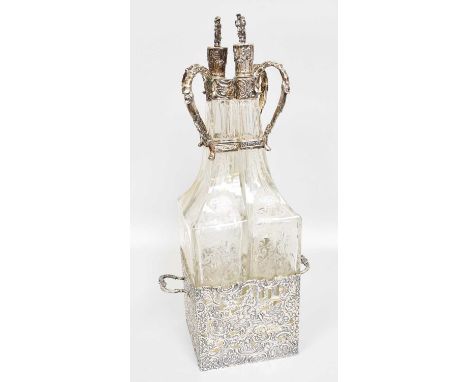 A German Silver-Mounted Engraved-Glass Decanter Set, With Pseudomarks, Early 20th Century, each of the four glass decanters e