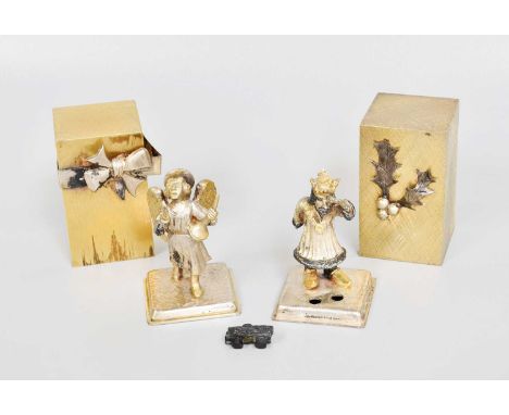 A Pair of Elizabeth II Parcel-Gilt Silver Novelty Presents, by Stuart Devlin, London, One 1971 and One 1974, Numbers 210 From