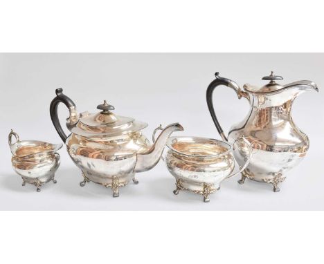 A Four-Piece George V Silver Tea-Service, by Cooper Brothers and Sons Ltd., Sheffield, 1917, each piece tapering and on four 