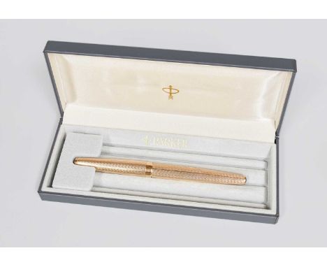 An Elizabeth II Gold Fountain-Pen, by Parker, London, 1968, 9ct, with an overall engine-turned finish and with arrow clip, in