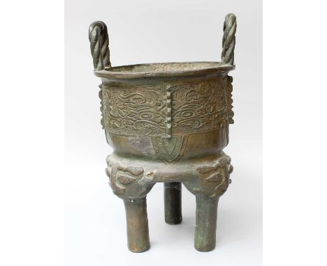 A Chinese Bronze Tripod Censer, in archaic style, with ropetwist handles, 39cm highLarge solder repair to one side of the bod