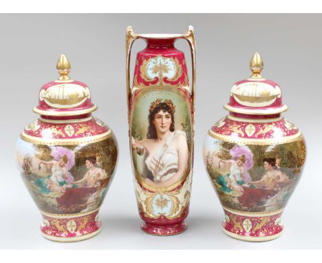 A Vienna Style Porcelain Twin-Handled Vase, 20th century, printed with the portrait of a maiden on a claret ground, 31cm high