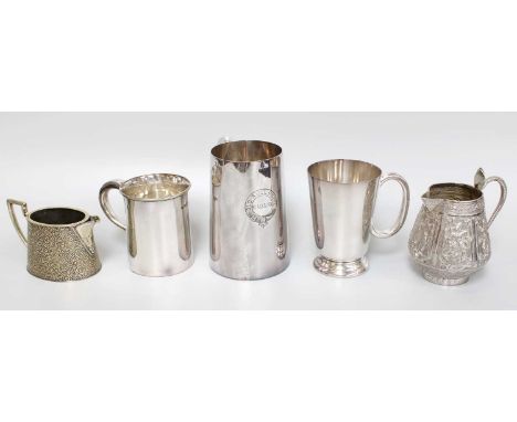 An Indian Silver Cream-Jug, Apparently Unmarked, Probably Early 20th Century, tapering, the sides chased with dieties in angu