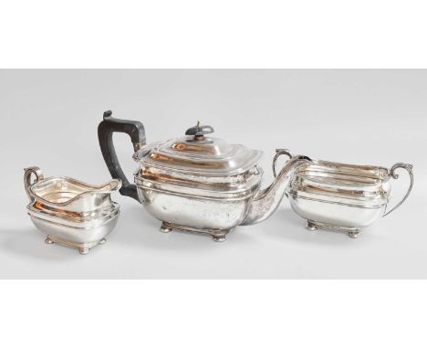 A Three-Piece George V Silver Tea-Service, by Carrington and Co., London, 1933, each piece in the George III-style, oblong an