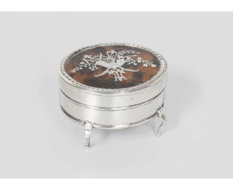 An Edward VII Silver and Tortoiseshell Ring-Box, by William Comyns, Birmingham, 1908, oval and on four scroll legs, the hinge