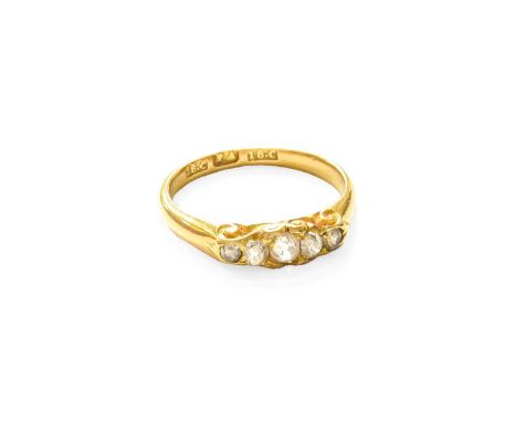 A Diamond Five Stone Ring, the graduated old cut diamonds, in yellow claw settings, to a tapered shoulder plain polished shan