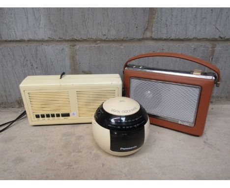 A spherical Panasonic clock radio and two others