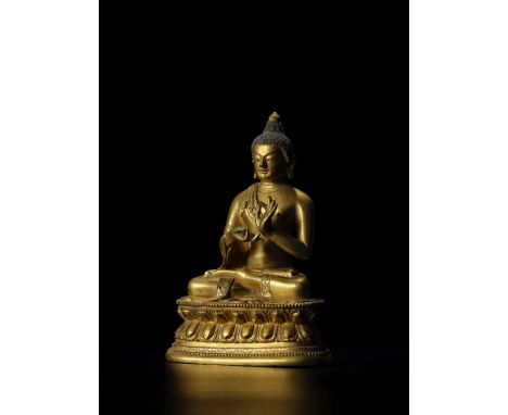 STATUETTE DE VAIROCANA EN ALLIAGE DE CUIVRE DORÉMONGOLIE, XIXE SIÈCLETibetan inscription to the back of the base: 22 sred med