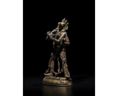 STATUETTE DE SHVANASYA EN ALLIAGE DE CUIVRE DORÉTIBET, VERS XVIIE SIÈCLEHimalayan Art Resources item no. 4624 18.5 cm (7 1/4 